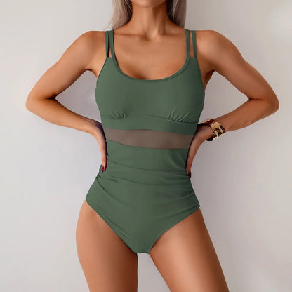 Olive green one-piece swimsuit with sheer mesh panel detail and thin straps.