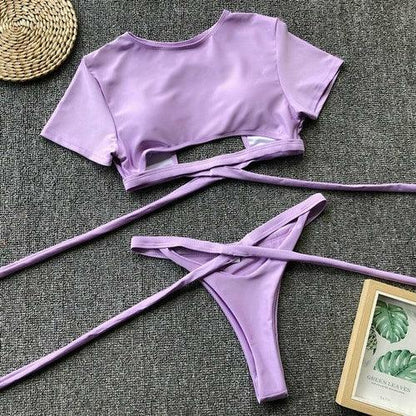 Two-piece lavender purple bikini set with a crop top and tie-side bottoms.