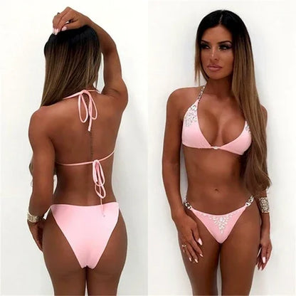 Woman wearing a light pink string bikini set with rhinestone embellishments