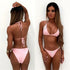 Woman wearing a light pink rhinestone embellished string bikini set, front and back views.